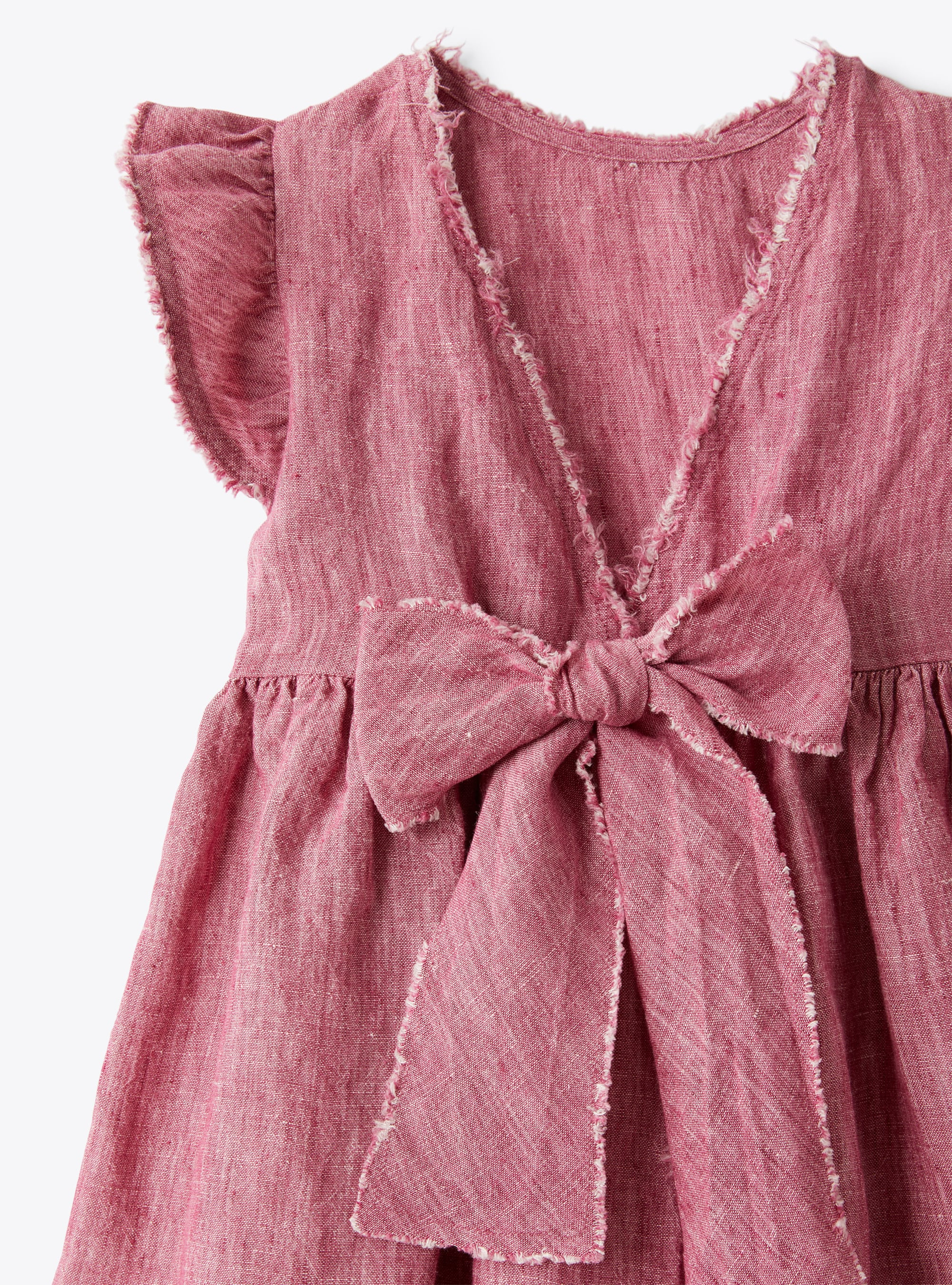 Linen dress with a bow detail in onion purple | Il Gufo