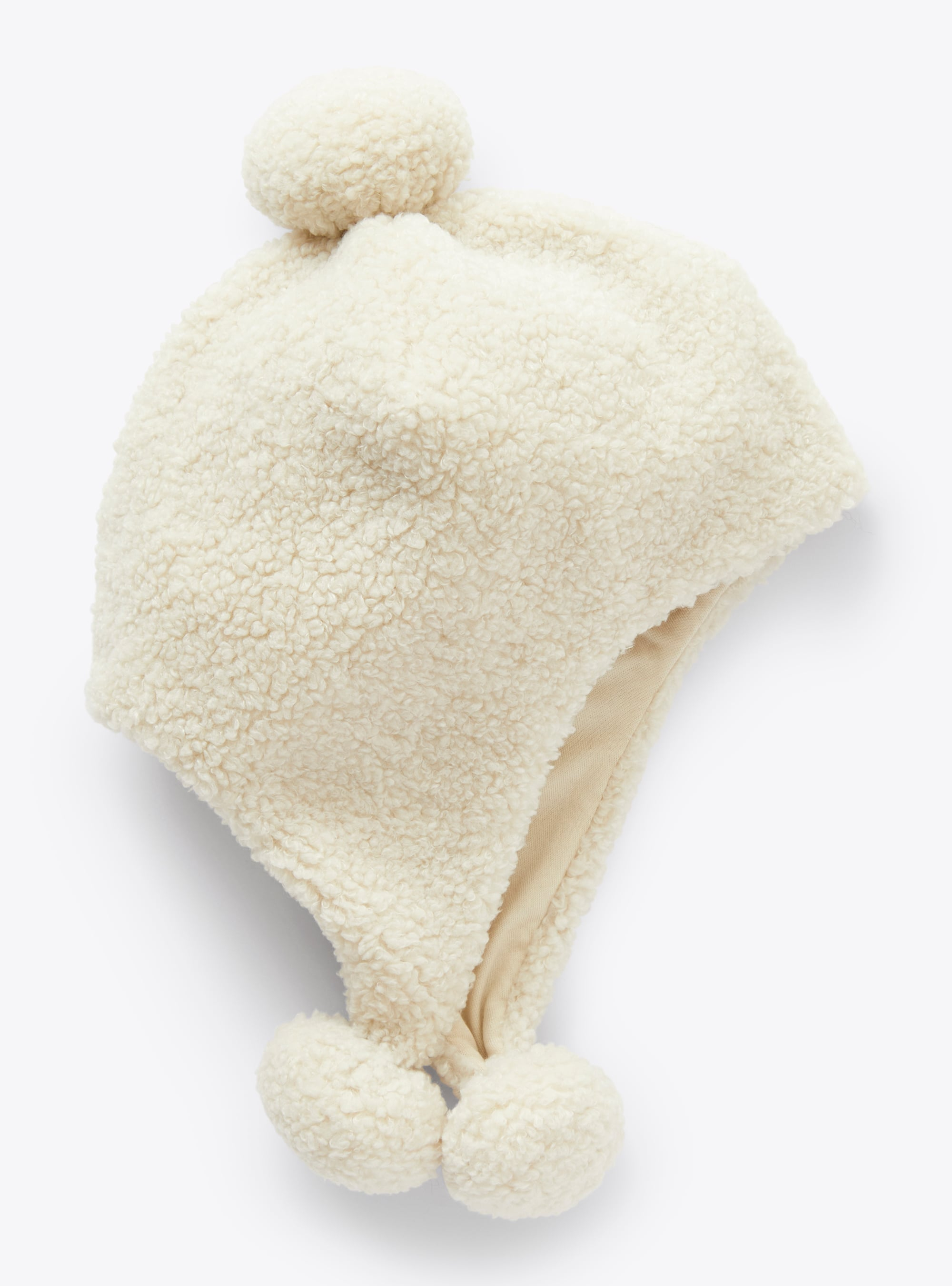 Teddy-fur hat with pompoms - Accessories - Il Gufo