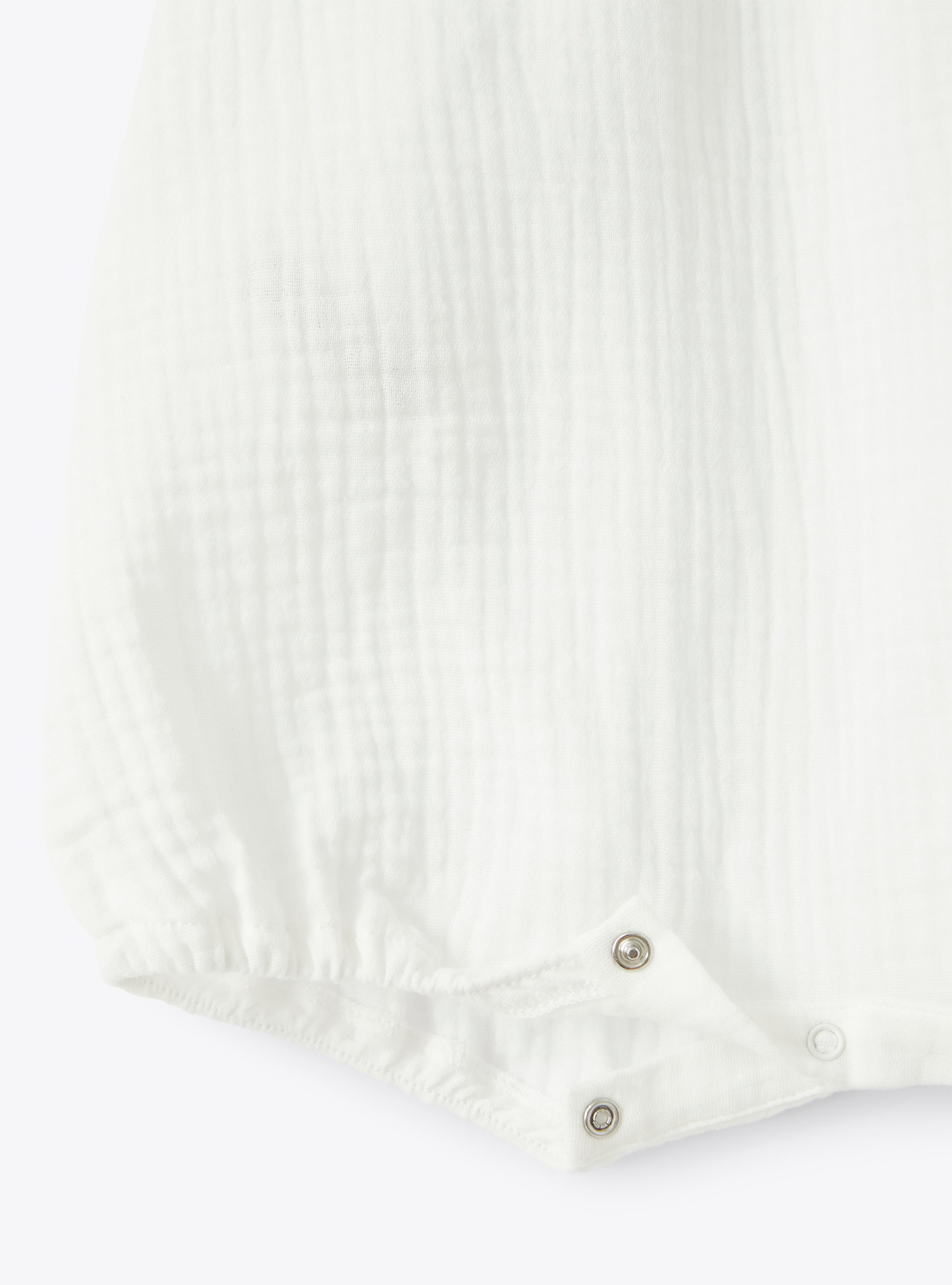 Romper suit in milky-white organic cotton gauze - White | Il Gufo