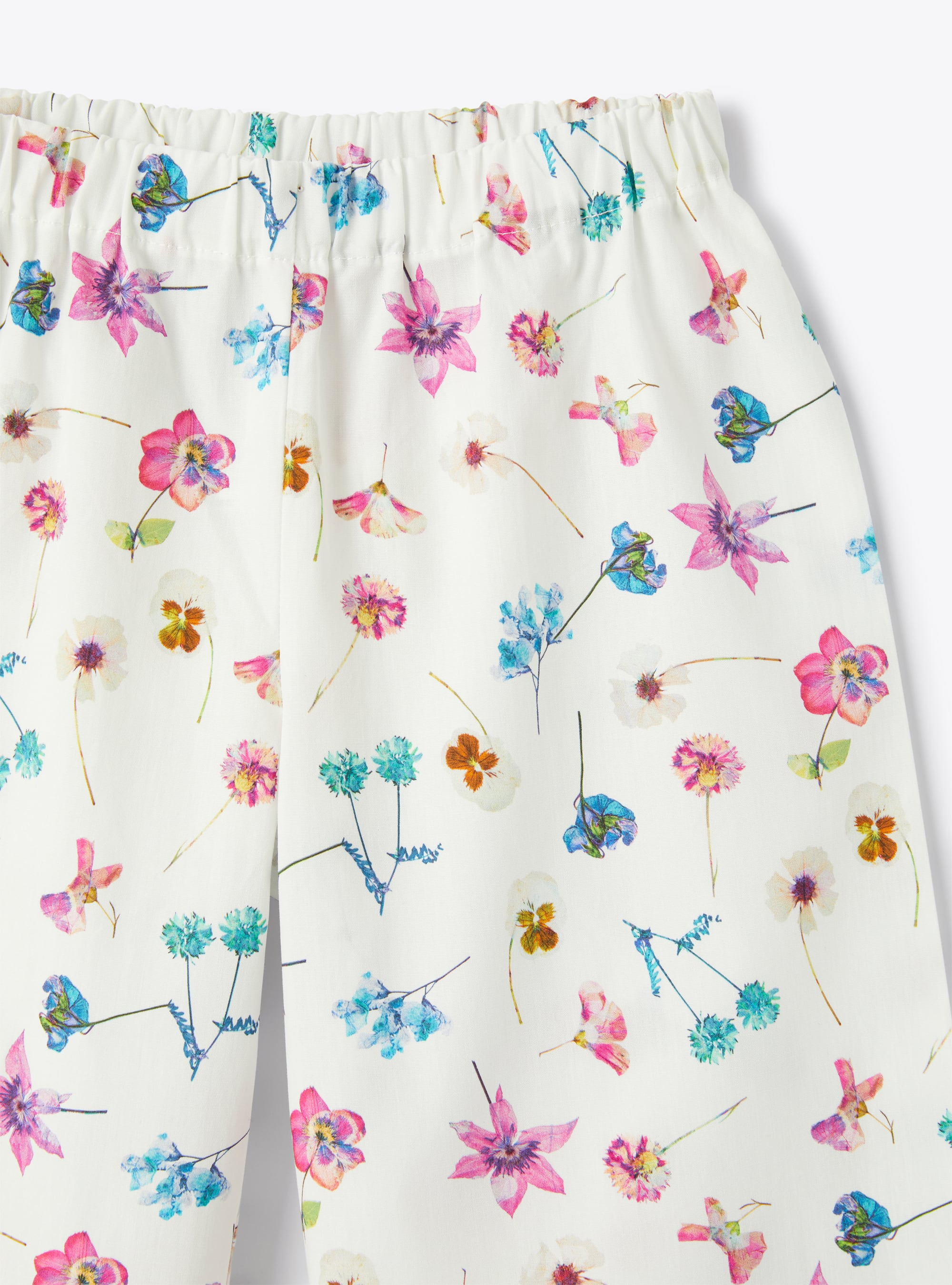 Trousers in a multi-coloured floral print - White | Il Gufo