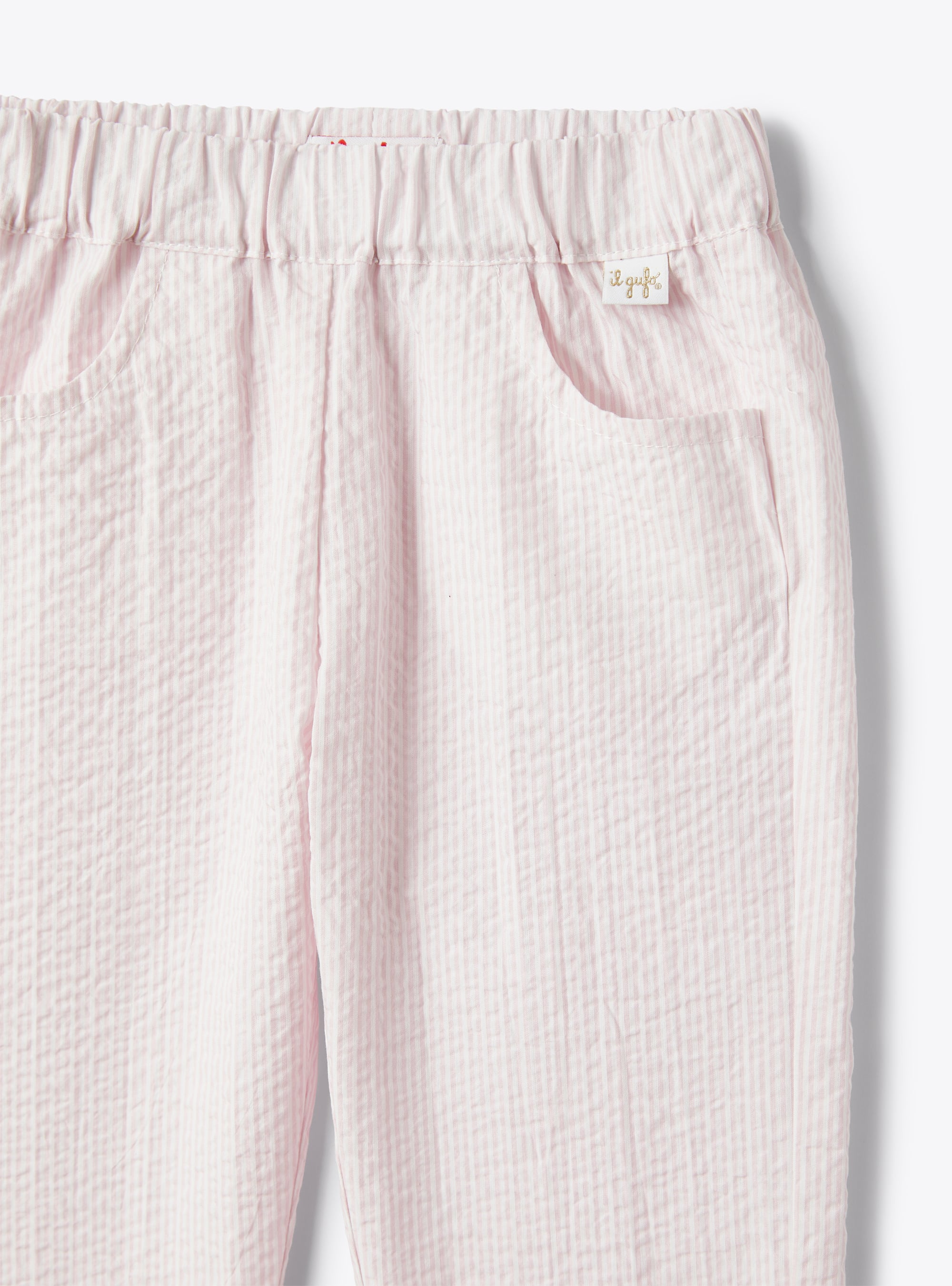 Trousers for baby girls in striped seersucker - Pink | Il Gufo
