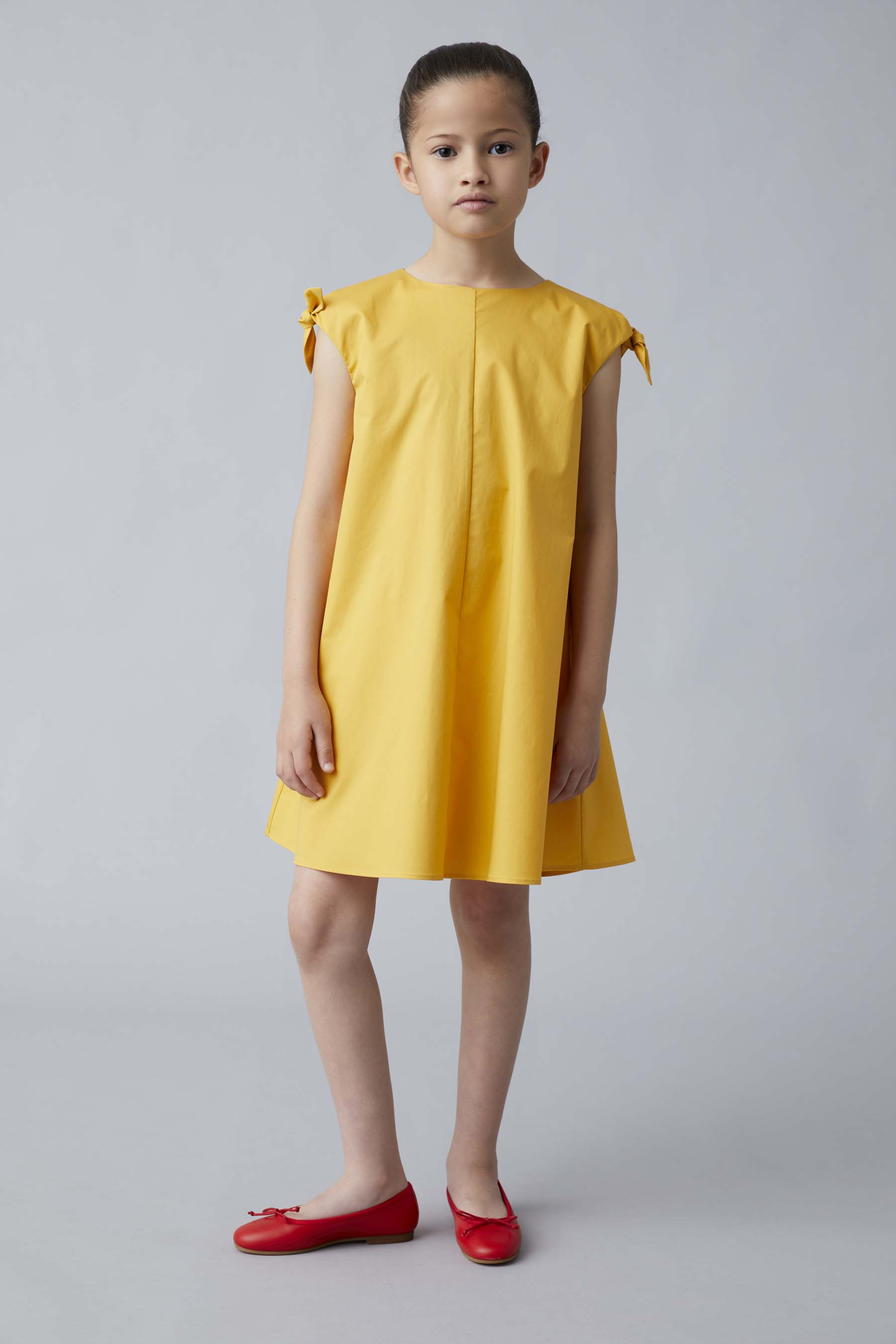 Dress in stretch poplin with bow embellishments in turmeric yellow - Yellow | Il Gufo